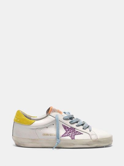 superstar sneakers with pink glittery star and yellow heel tab